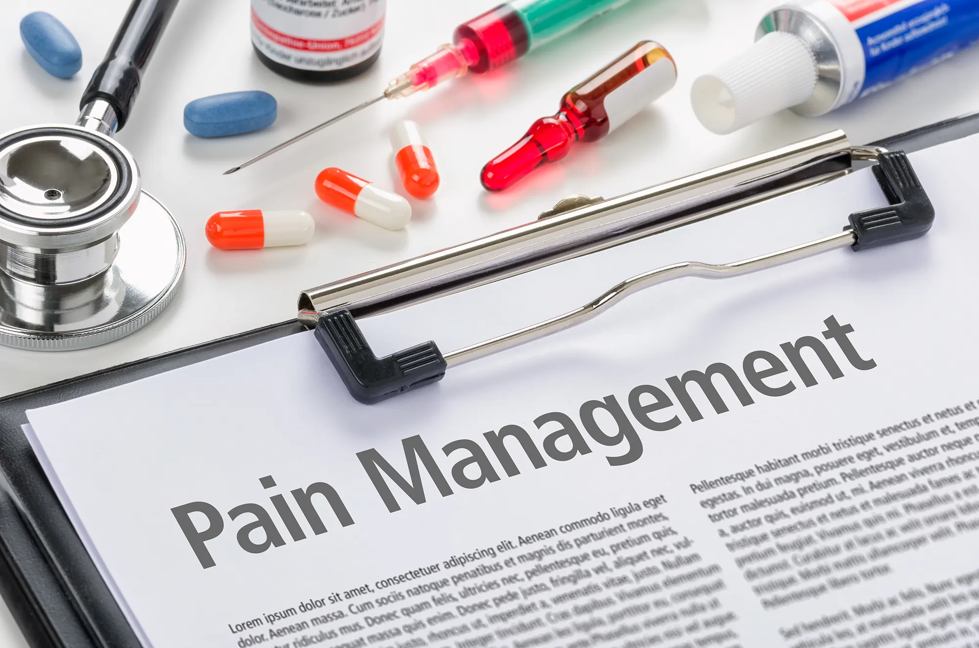 Pain Management written on a clipboard
