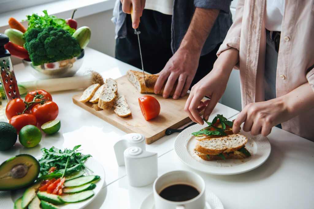 Hands of a couple preparing healthy breakfast. Daily routine. Healthy lifestyle. Healthy diet. Healthy meal.